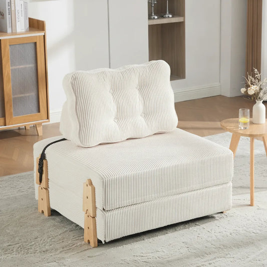 Fauteuil lit pliant Groix en velours côtelé beige lin dans un salon