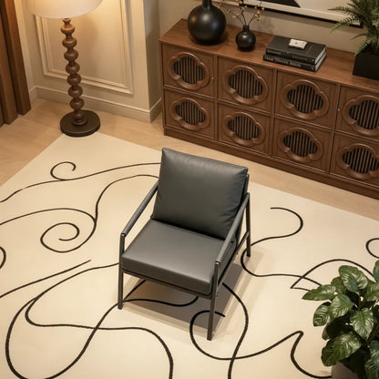 Fauteuil cuir et métal noir vu de haut dans un salon