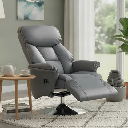 Fauteuil pivotant relax gris en simili cuir incliné avec repose-pieds dans un salon lumineux