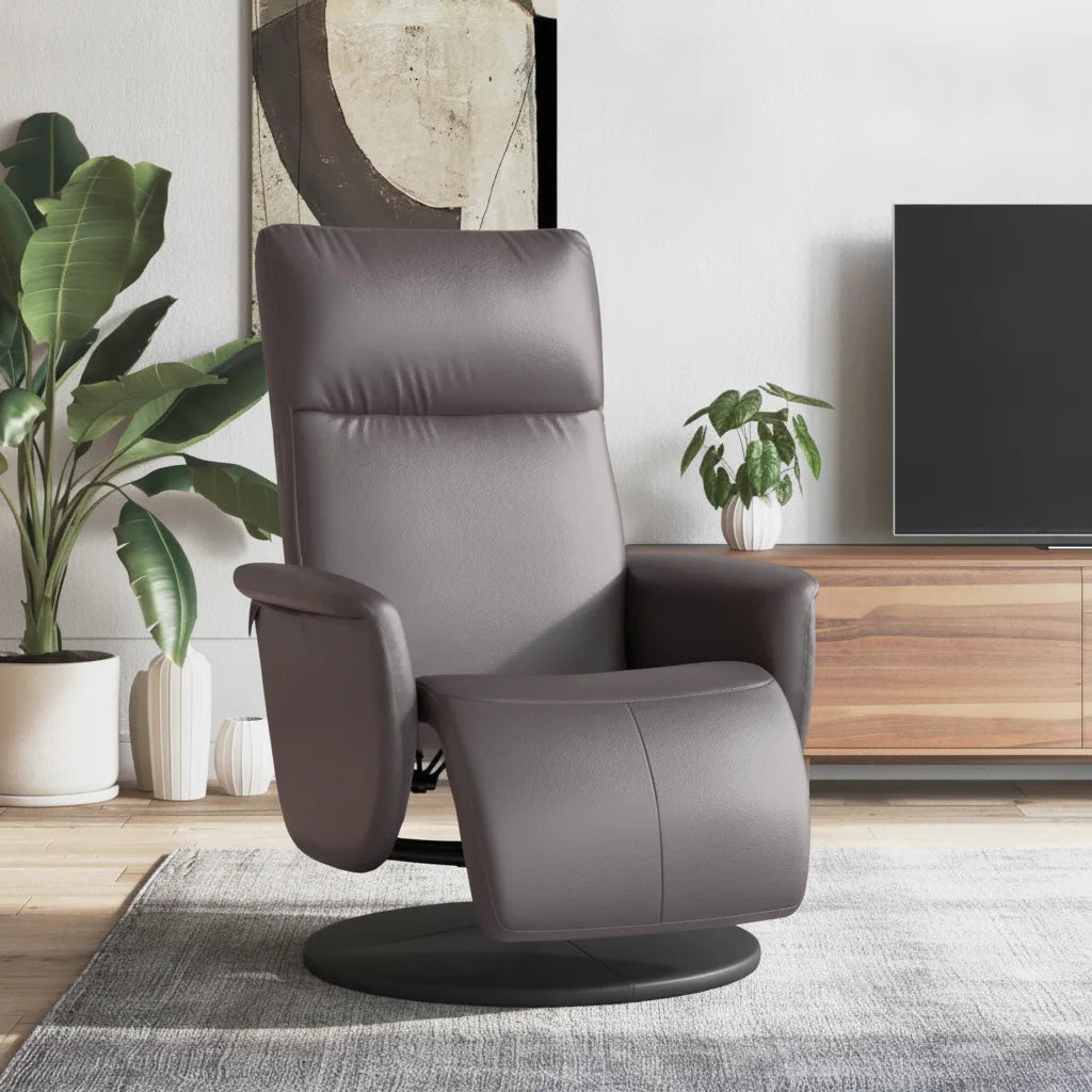 Fauteuil inclinable cuir synthétique gris anthracite pivotant dans un salon moderne