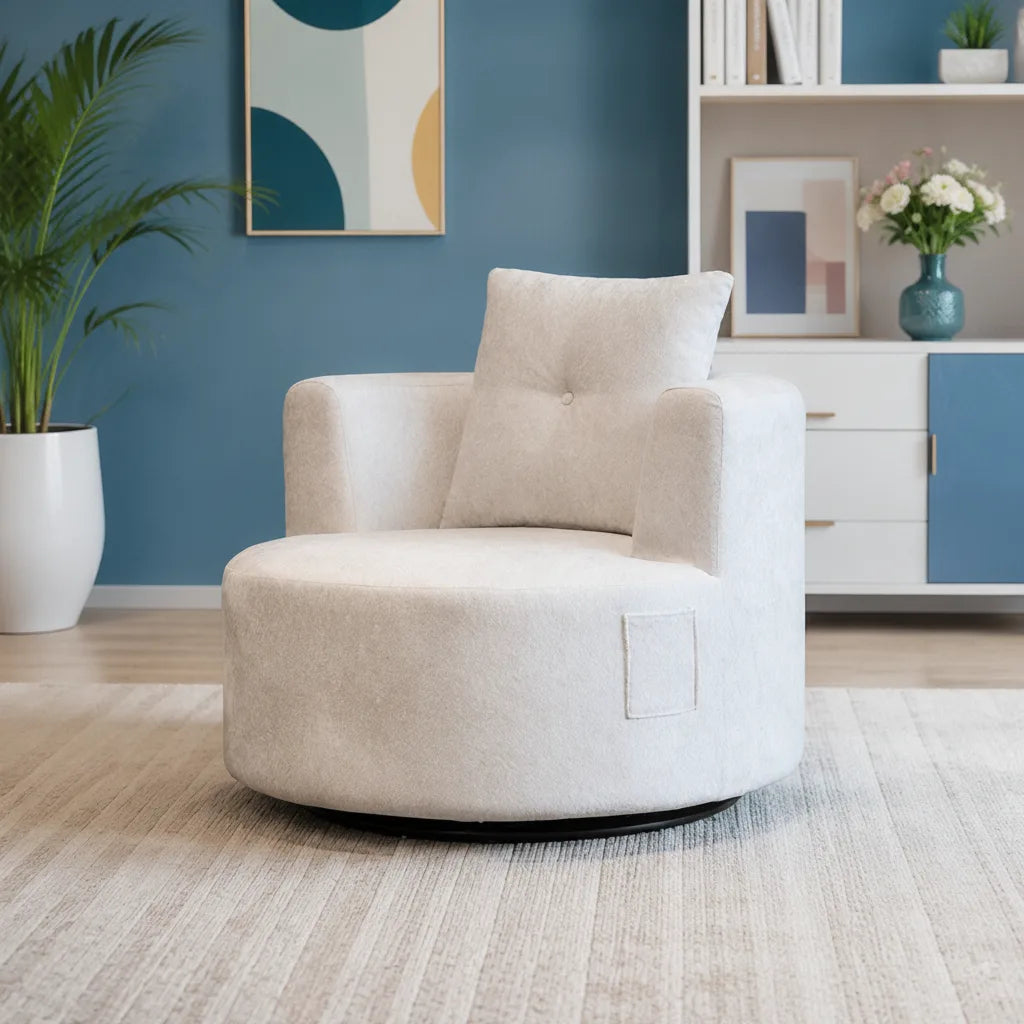 Fauteuil pivotant confort rond blanc avec coussin, dans un salon bleu