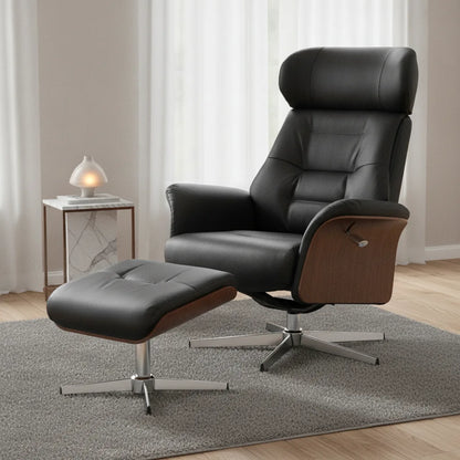 Fauteuil design avec repose pied Concarneau noir dans un salon lumineux