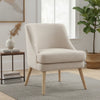 Petit fauteuil scandinave Paimpol beige lin dans un salon lumineux avec plante