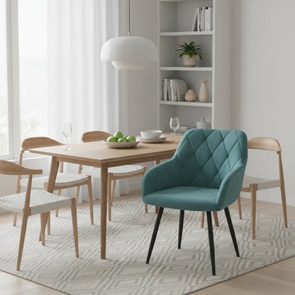 Fauteuil salle à manger velours bleu canard autour d'une table