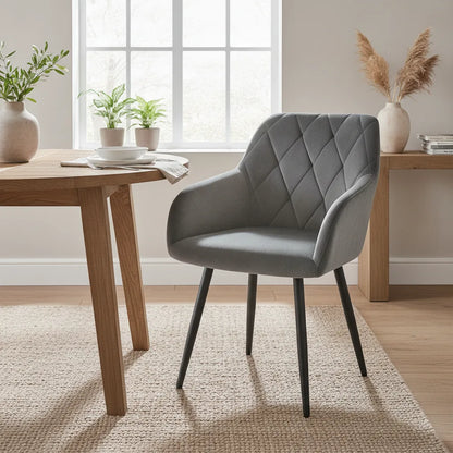 Fauteuil salle à manger velours gris anthracite dans une salle à manger