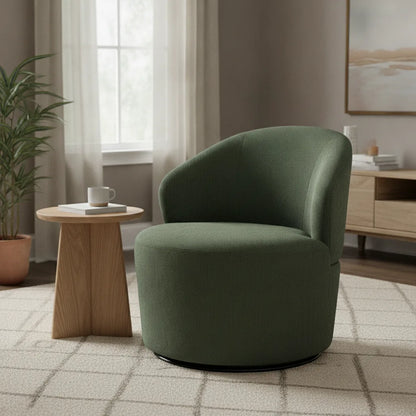 Fauteuil pivotant vert Bénodet forme tonneau près d'une fenêtre