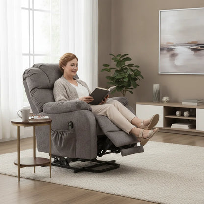 Fauteuil relax électrique tissu Quiberon gris pour lire au calme près d'une fenêtre