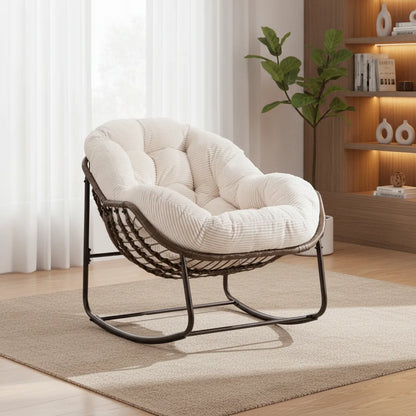 Fauteuil à bascule cocooning Loctudy coussin XXL dans un coin lecture