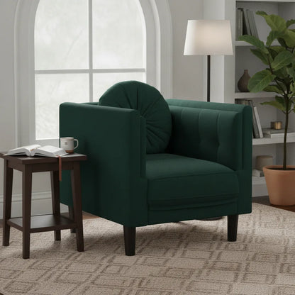 Fauteuil vert foncé près d'une fenêtre et d'une table d'appoint