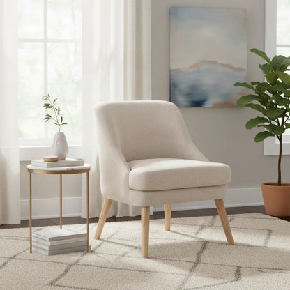 Petit fauteuil scandinave Paimpol en tissu aspect lin dans un coin lecture