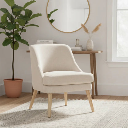 Petit fauteuil scandinave Paimpol pieds en bois dans une entrée avec miroir rond