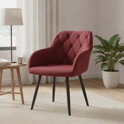 Fauteuil salle à manger velours rouge bordeaux près d'une plante